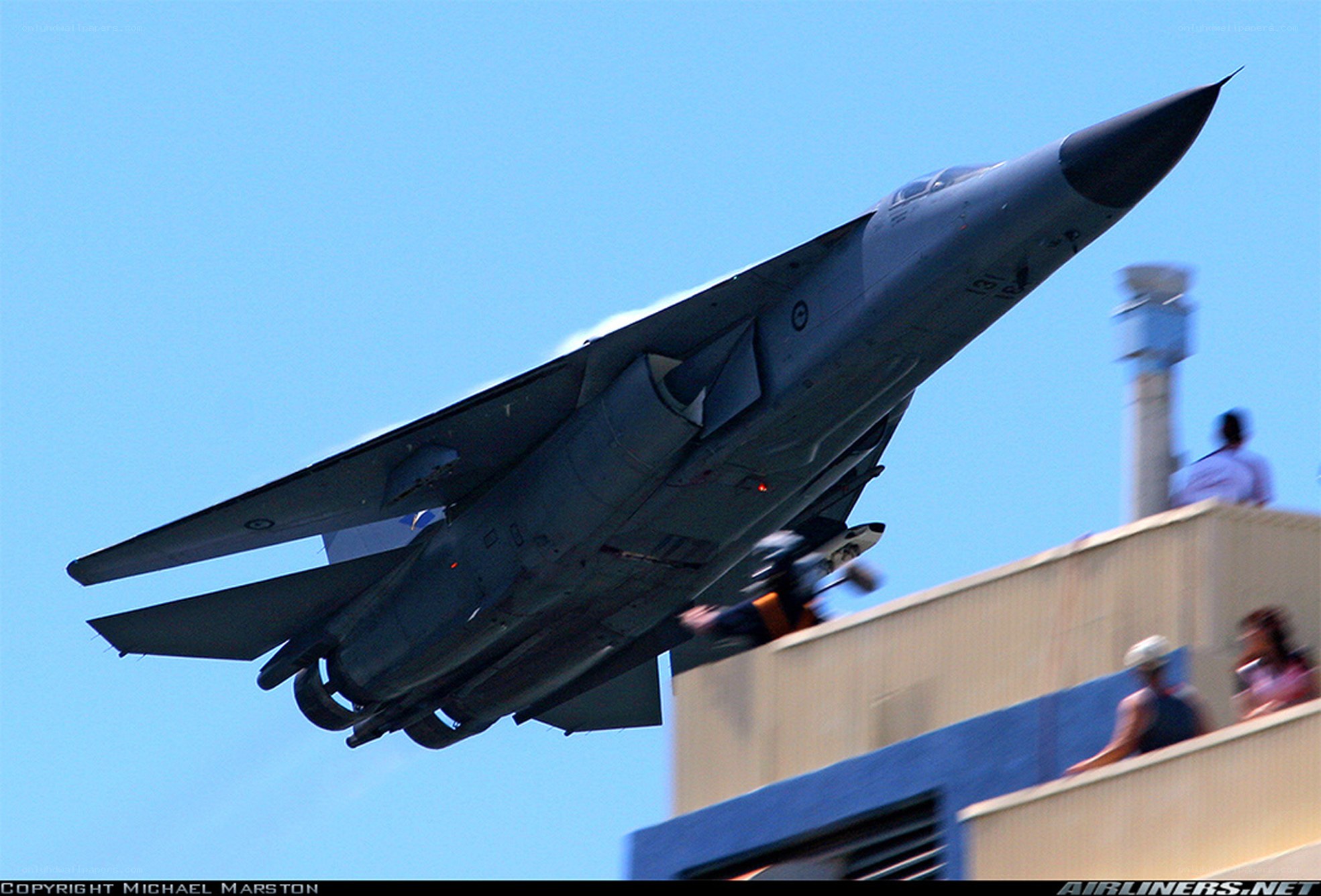 fighter jet flying low