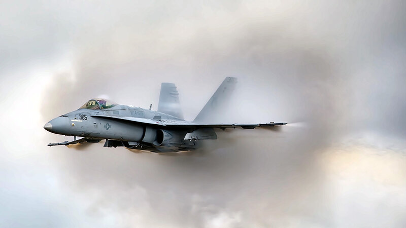 fighter jet in cloud