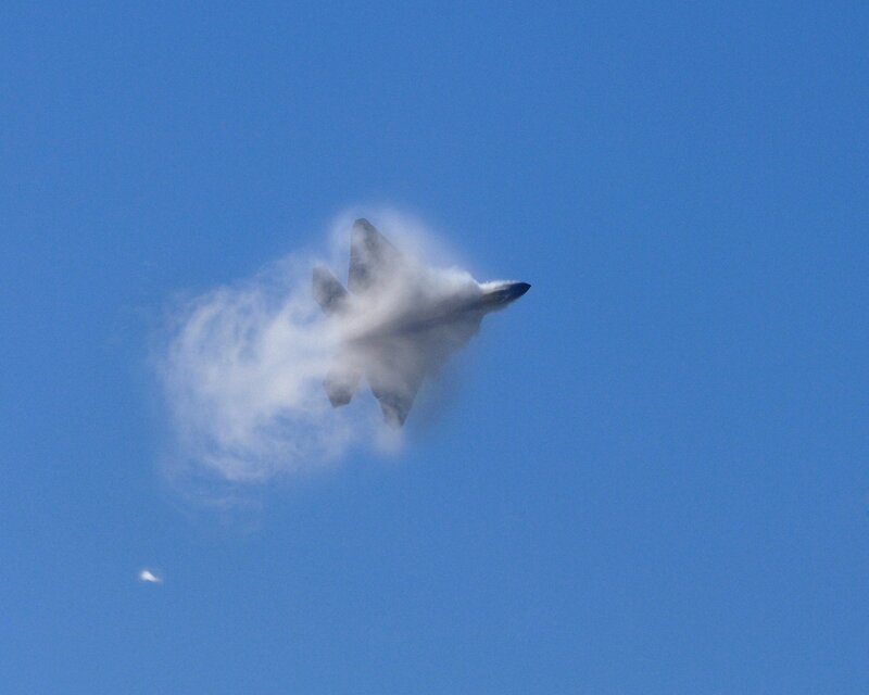 fighter jet in cloud