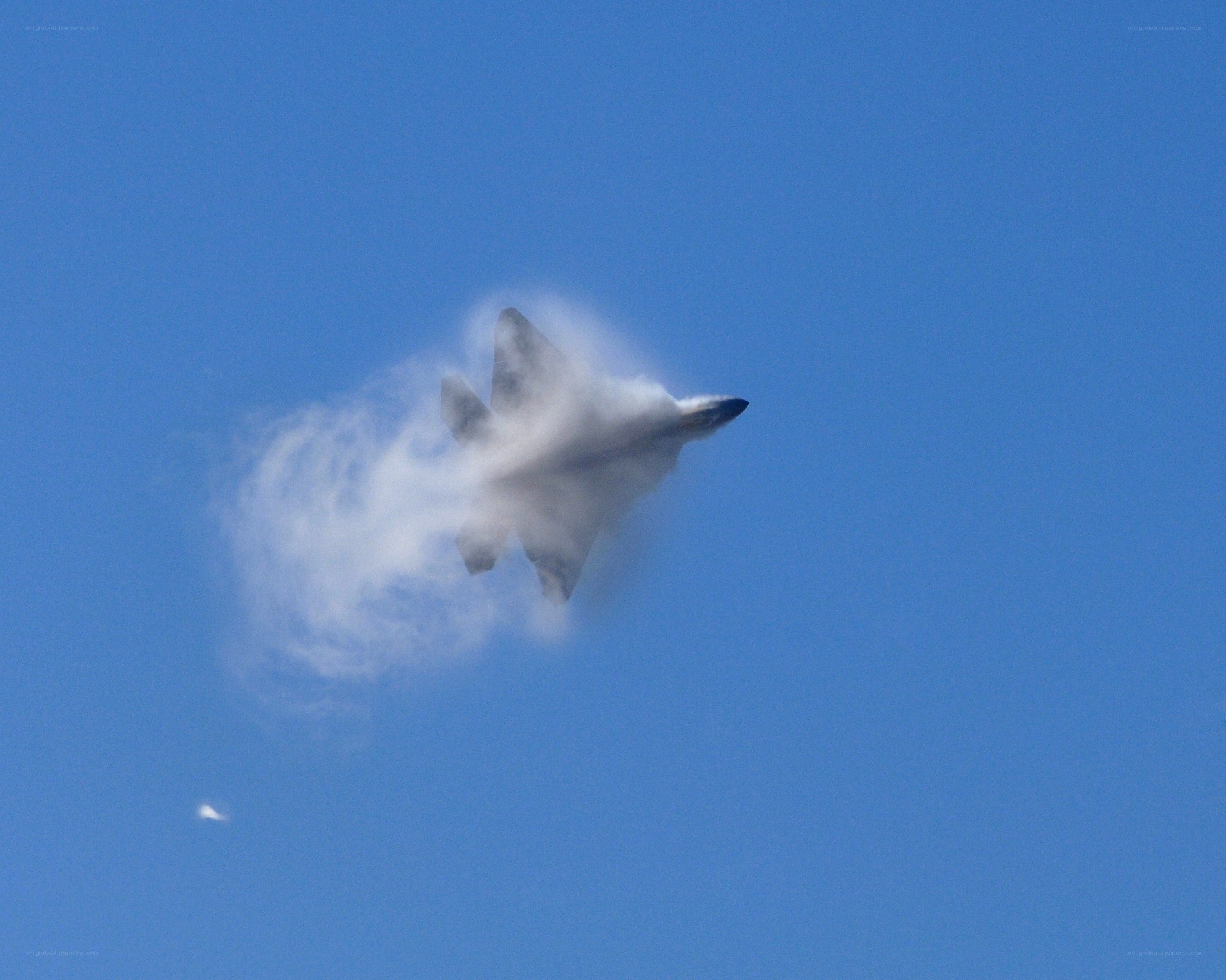 fighter jet in cloud
