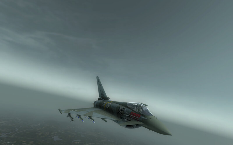 fighter jet in cloudy sky