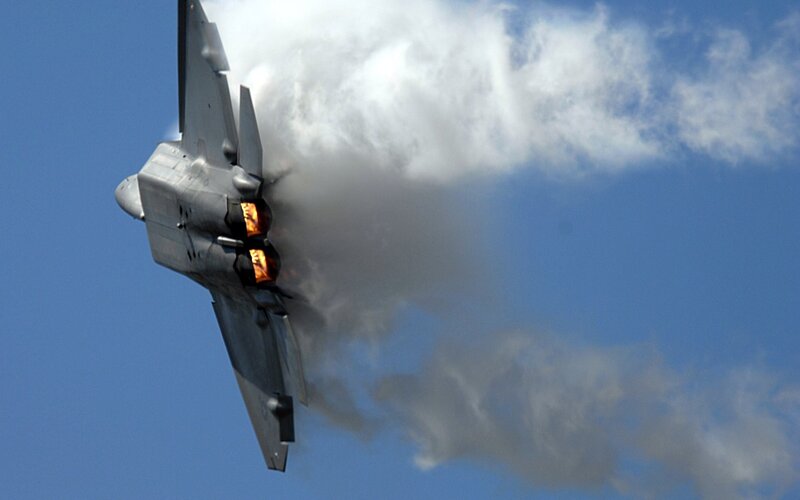 Fighter Jet in Flight — Blue, Dramatic, Afternoon, Photograph, Jet Engine, Exhaust, Clouds