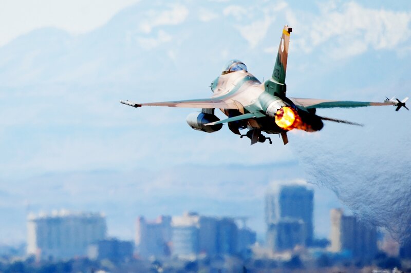 Fighter Jet in Flight — Blue, Dramatic, Afternoon, Photograph, Mountains