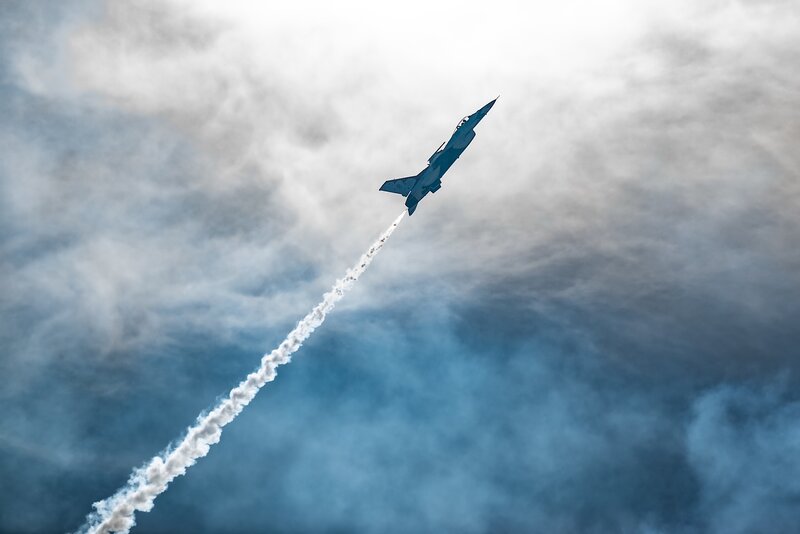 Fighter Jet in Flight — Blue, Dramatic, Photograph, Smoke Trail