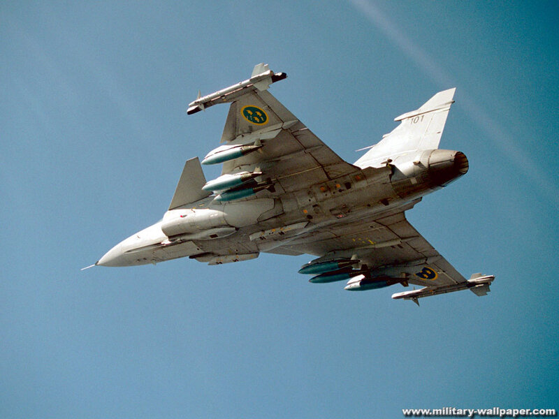 Fighter Jet in Flight — Blue, Dynamic, Afternoon, Photograph, Missiles