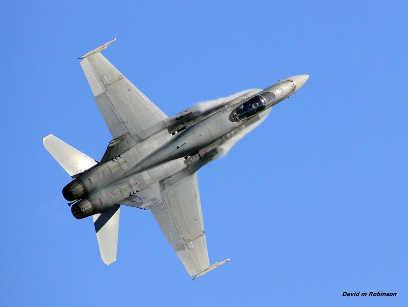 Fighter Jet in Flight — Blue, Dynamic, Afternoon, Photograph, Sky, Clouds