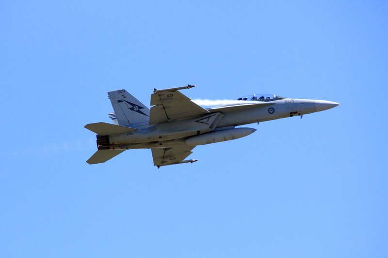 Fighter Jet in Flight — Blue, Dynamic, Afternoon, Photograph, Sky, Smoke