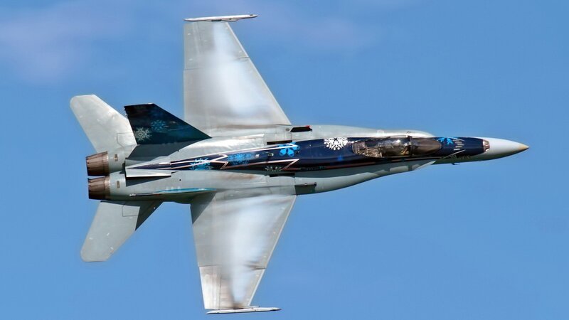 Fighter Jet in Flight — Blue, Dynamic, Afternoon, Photograph, Sky, Snowflakes