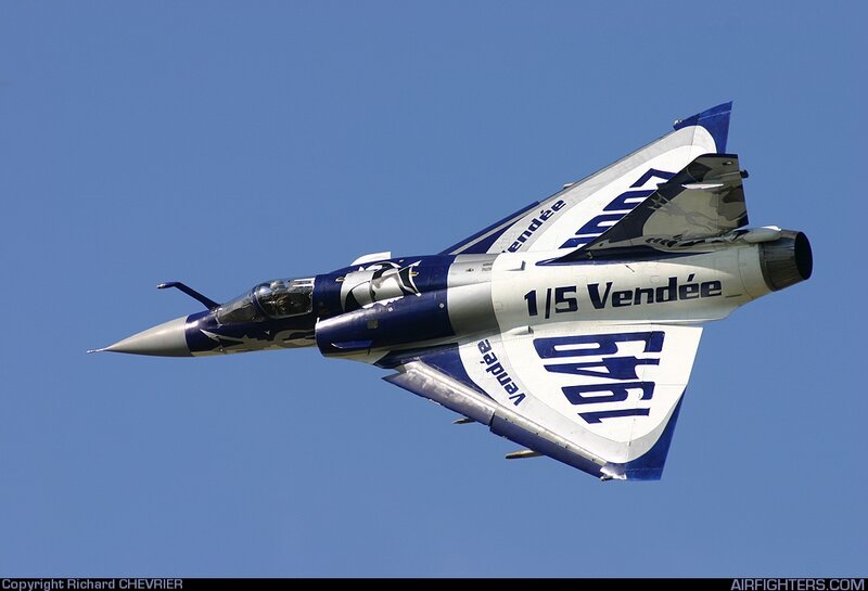 Fighter Jet in Flight — Blue, Dynamic, Afternoon, Photograph, Sky, Text