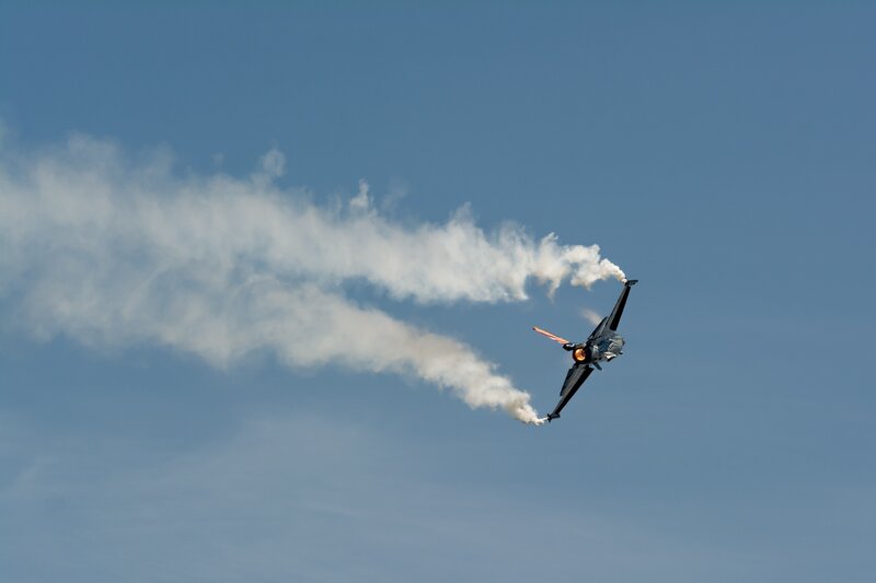 Fighter Jet in Flight — Blue, Dynamic, Afternoon, Photograph, Smoke