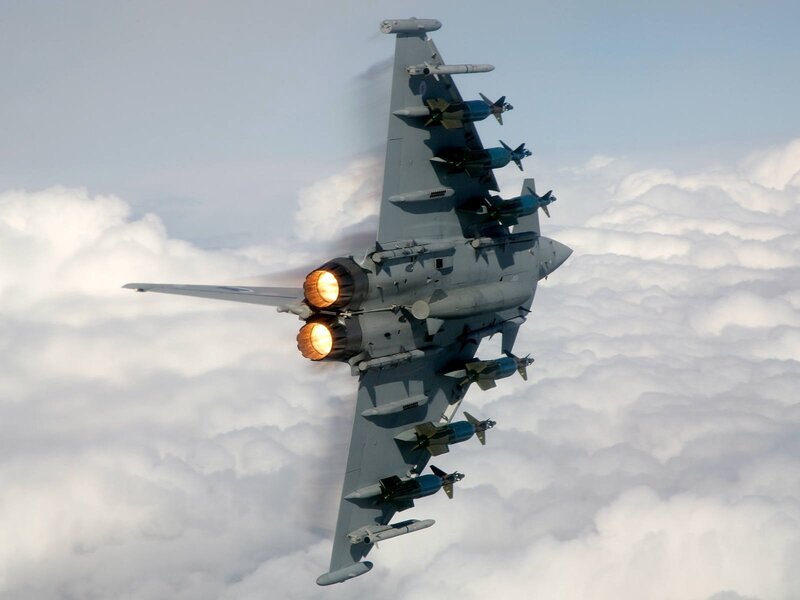 Fighter Jet in Flight — Clouds