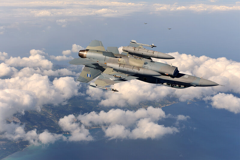 Fighter Jet in Flight — Gray, Dramatic, Afternoon, Photograph, Clouds, Ocean