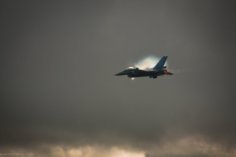 Fighter Jet in Flight — Gray, Dramatic, Afternoon, Photograph, Clouds