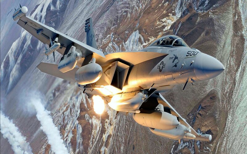 Fighter Jet in Flight — Gray, Dramatic, Afternoon, Photograph, Mountains, Missiles