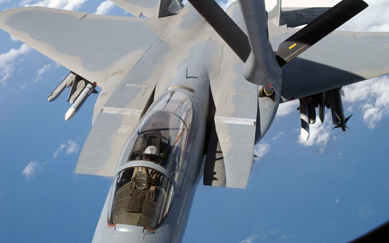 Fighter Jet in Flight — Gray, Dramatic, Afternoon, Photograph, Pilot, Missiles, Clouds
