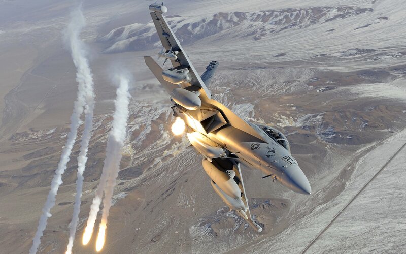 Fighter Jet in Flight — Gray, Dramatic, Afternoon, Photograph, Smoke Trails, Mountains, Missiles