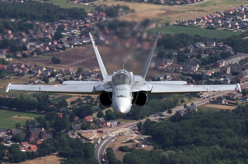 Fighter Jet in Flight — Gray, Dramatic, Afternoon, Photograph, Town
