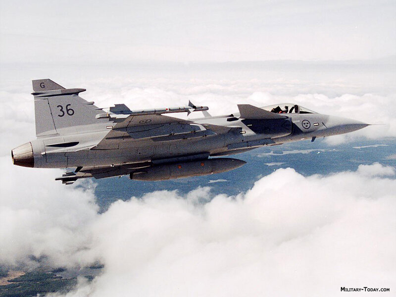 Fighter Jet in Flight — Gray, Dramatic, Photograph, Clouds, Missiles, Pilot