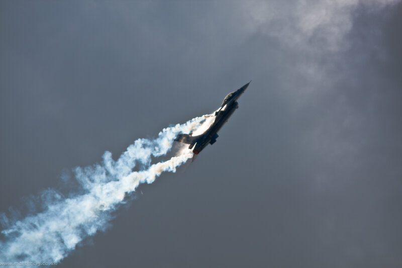 Fighter Jet in Flight — Gray, Dramatic, Photograph, Smoke Trail, Clouds