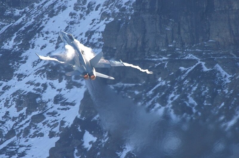 Fighter Jet in Flight — Gray, Dramatic, Winter, Photograph, Mountain