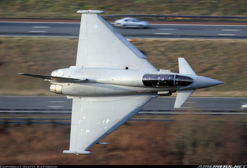 Fighter Jet in Flight — Gray, Dynamic, Afternoon, Photograph, Aircraft