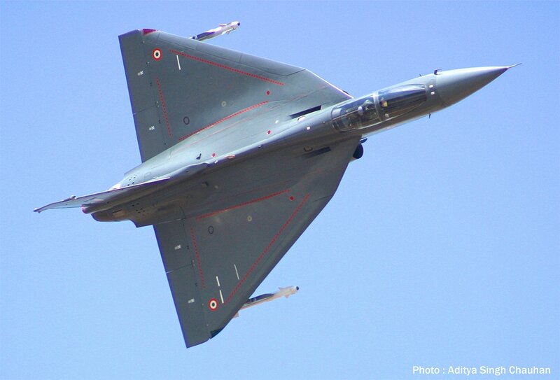 Fighter Jet in Flight — Gray, Dynamic, Afternoon, Photograph, Missile