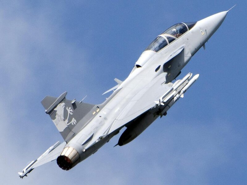 Fighter Jet in Flight — Gray, Dynamic, Afternoon, Photograph, Missiles
