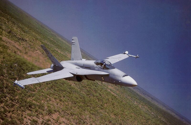 Fighter Jet in Flight — Gray, Dynamic, Afternoon, Photograph, Mountain