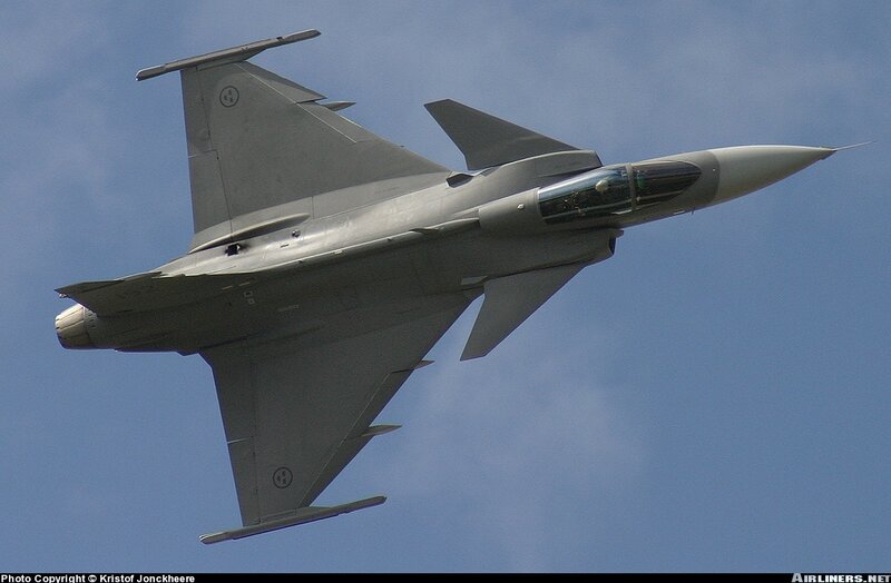 Fighter Jet in Flight — Gray, Dynamic, Afternoon, Photograph, Sky