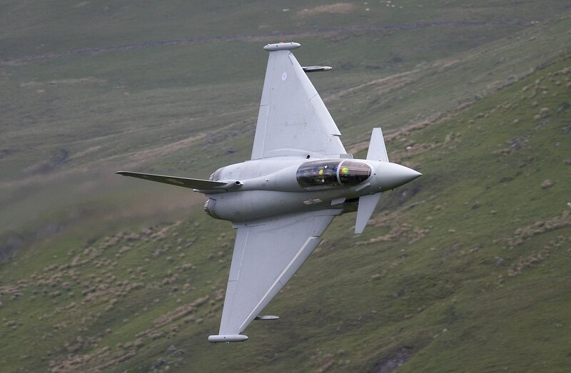 Fighter Jet in Flight — Gray, Dynamic, Photograph, Aircraft, Hills