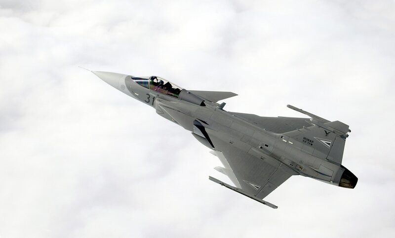 Fighter Jet in Flight — Gray, Dynamic, Photograph, Clouds, Pilot