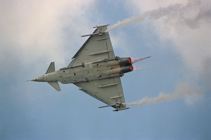 Fighter Jet in Flight — Gray, Dynamic, Photograph, Smoke, Flames
