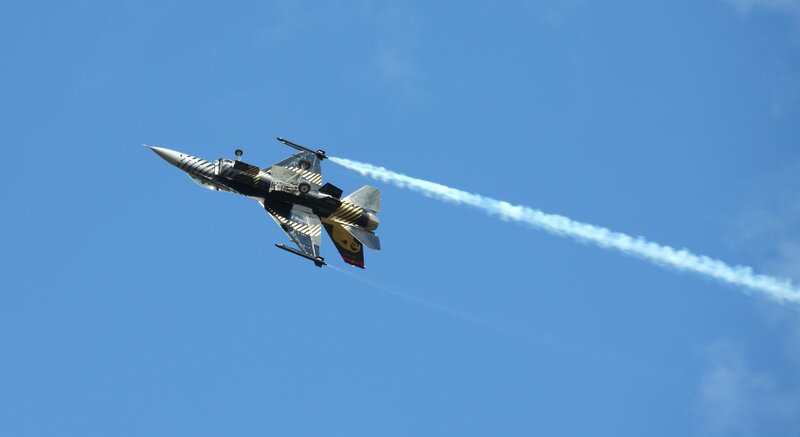 Fighter Jet in Flight — Smoke Trail