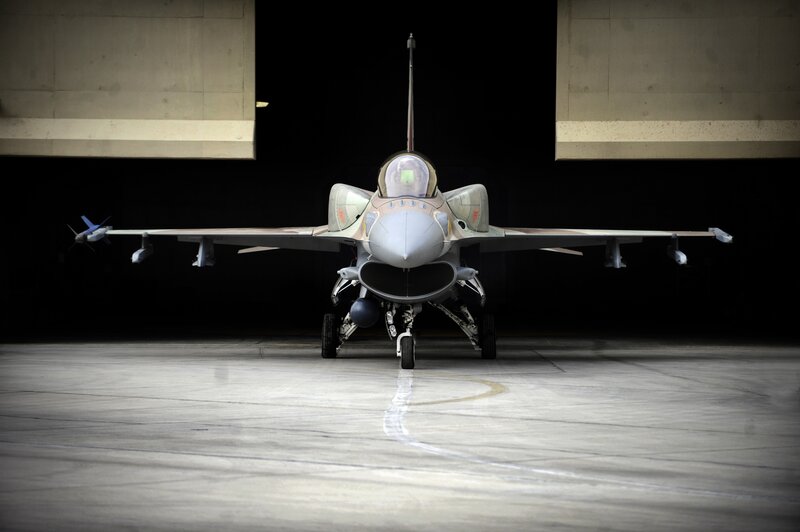 Fighter Jet in Hangar — Gray, Dramatic, Photograph, Missile