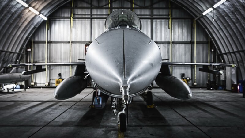 Fighter Jet in Hangar — Gray, Dramatic, Photograph, Wings