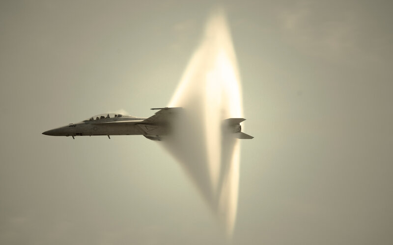 Fighter Jet in Supersonic Flight — Gray