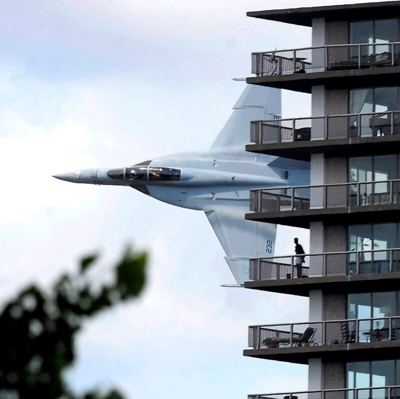 Fighter Jet Near Building