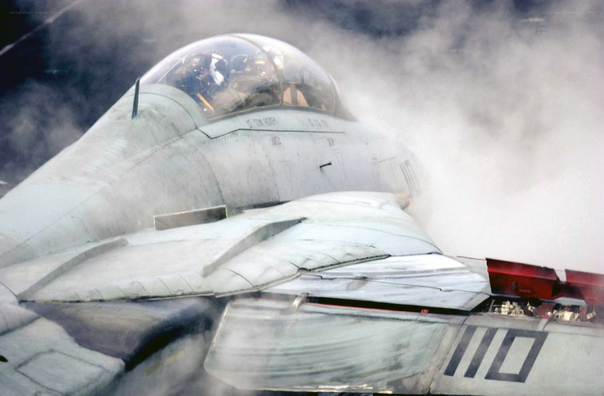 fighter jet on aircraft carrier