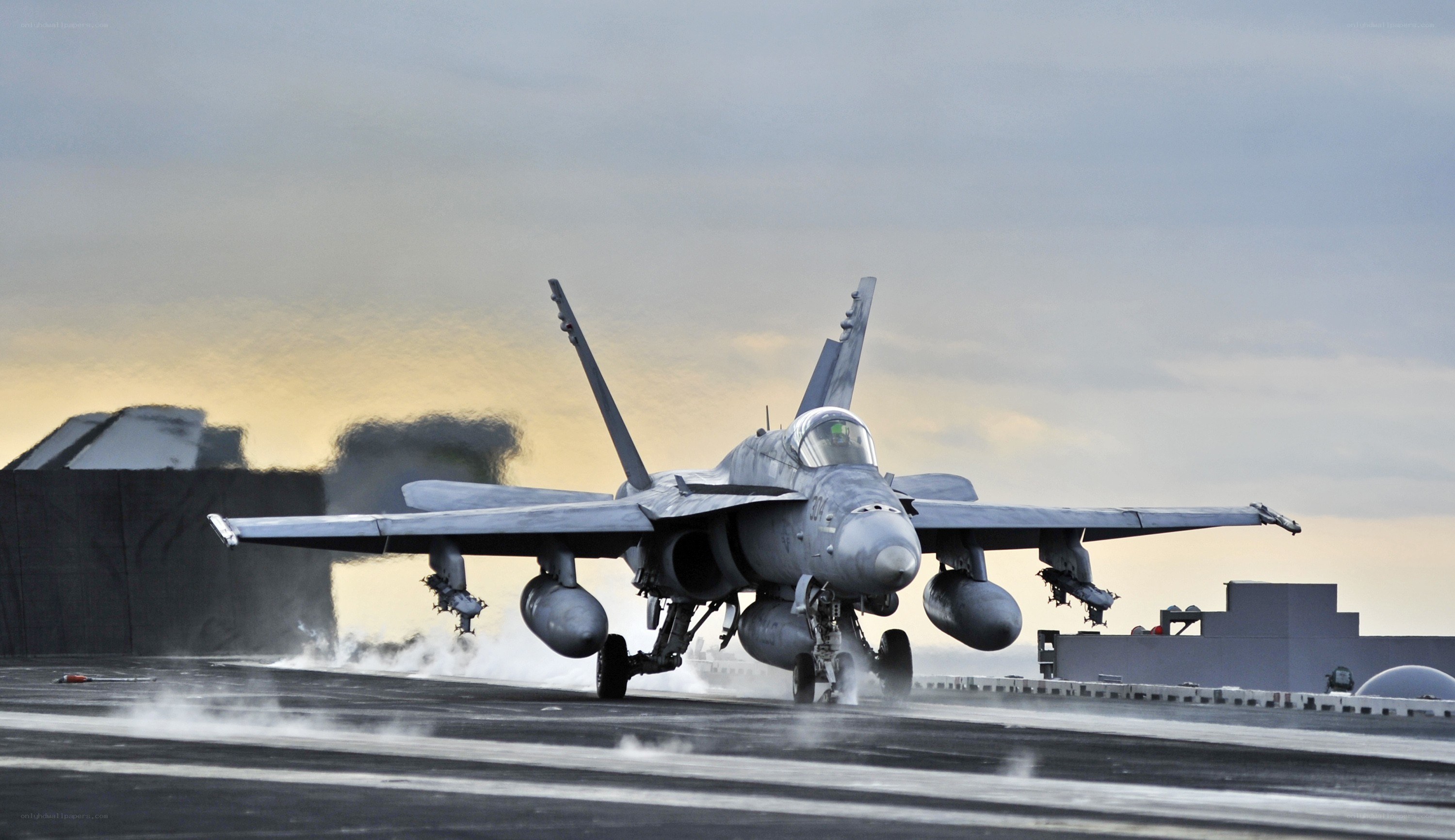 Fighter jet on aircraft carrier