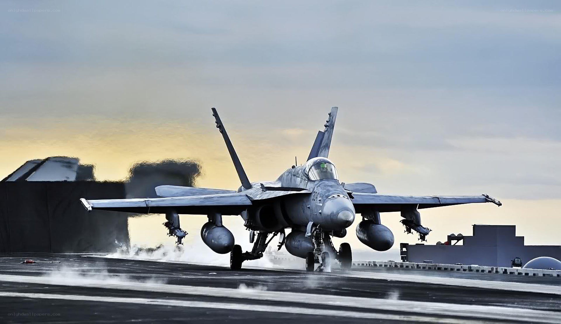 Fighter jet on aircraft carrier