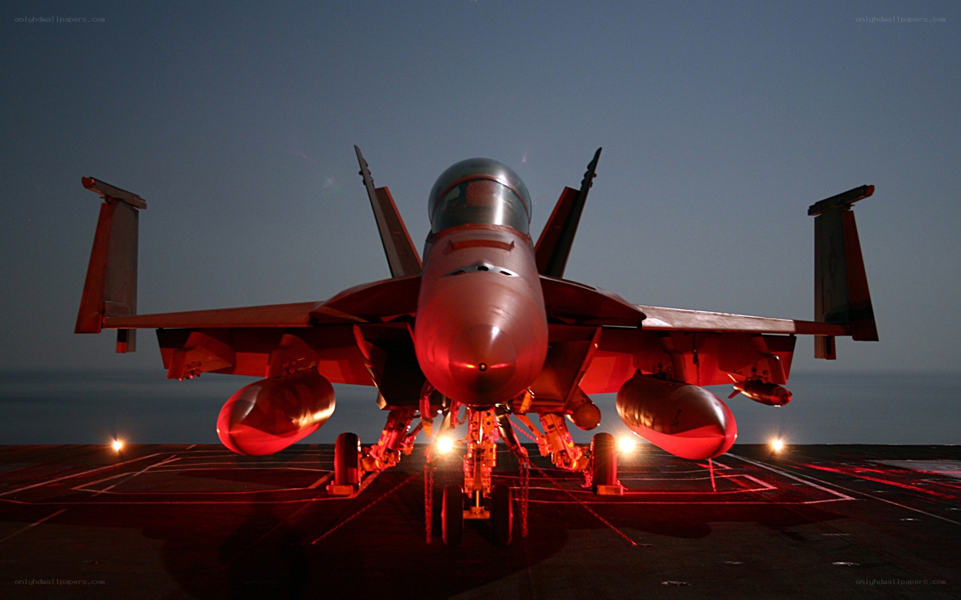 fighter jet on aircraft carrier