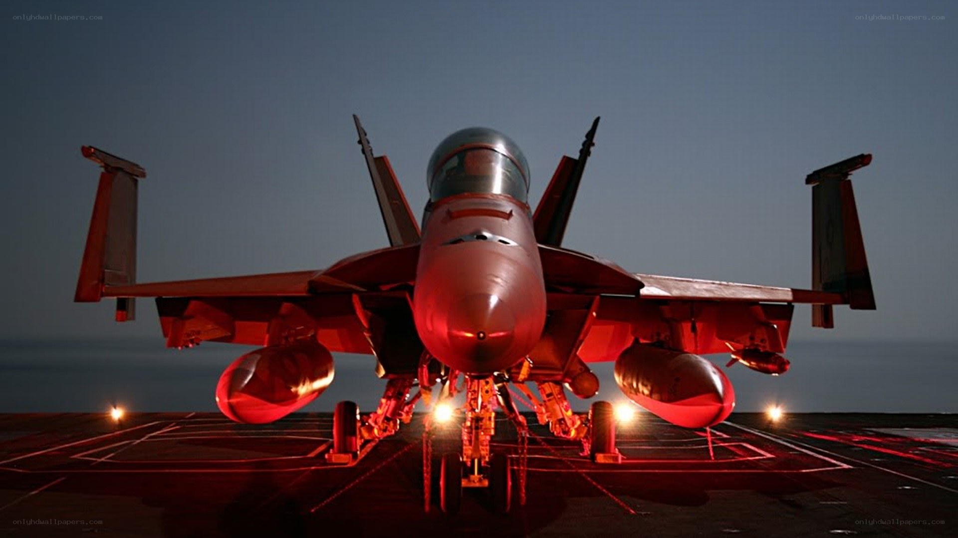 fighter jet on aircraft carrier