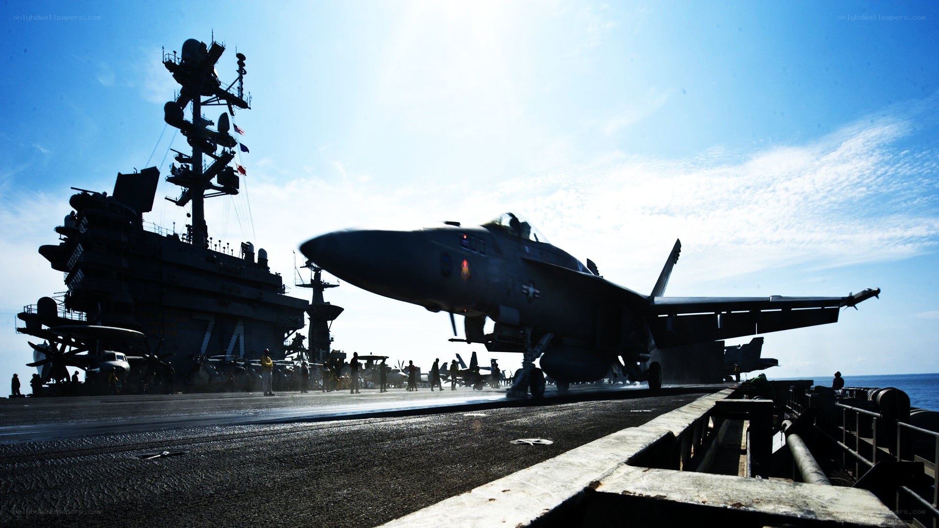Fighter jet on aircraft carrier deck