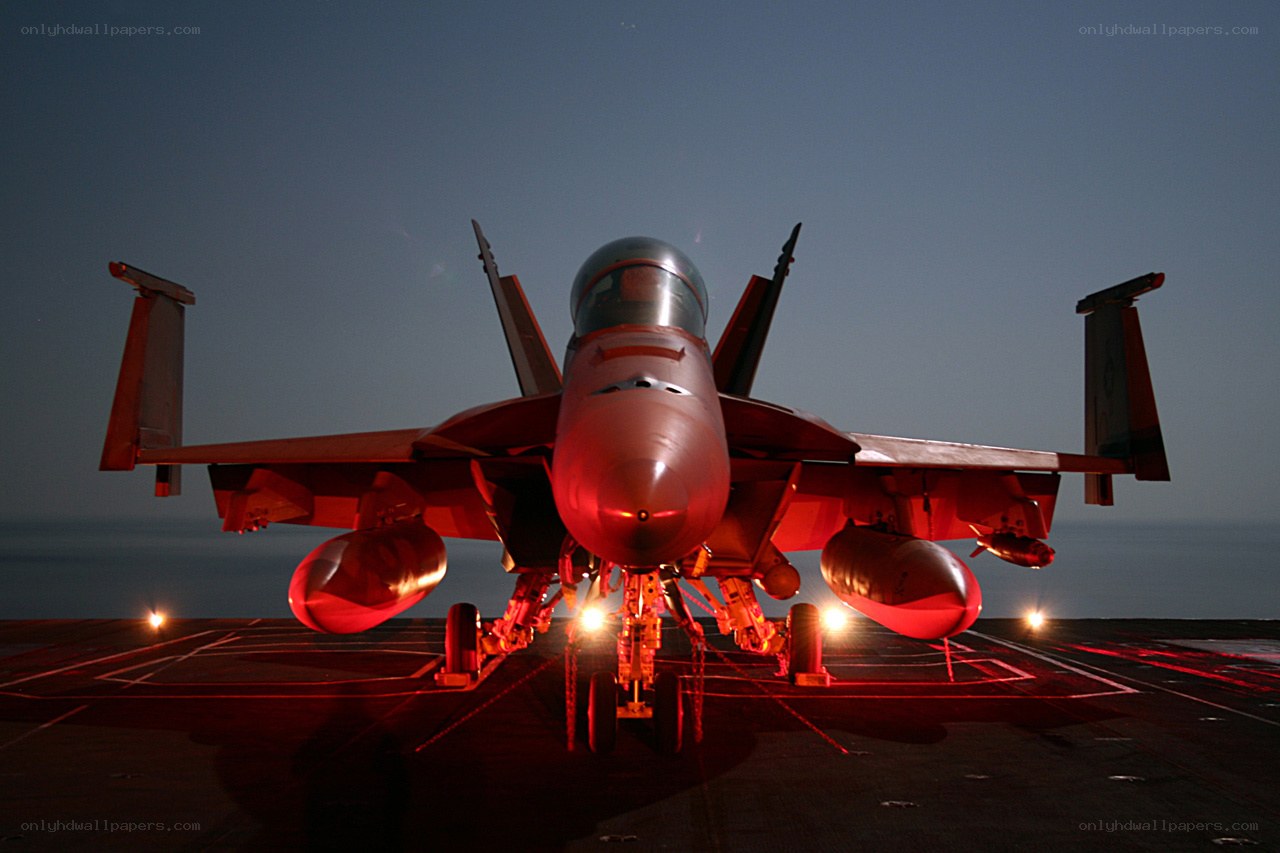 Fighter jet on aircraft carrier deck
