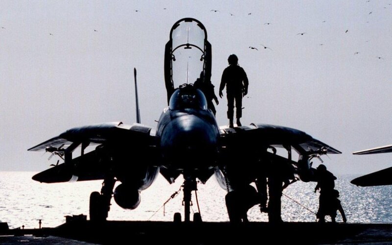 Fighter jet on aircraft carrier deck