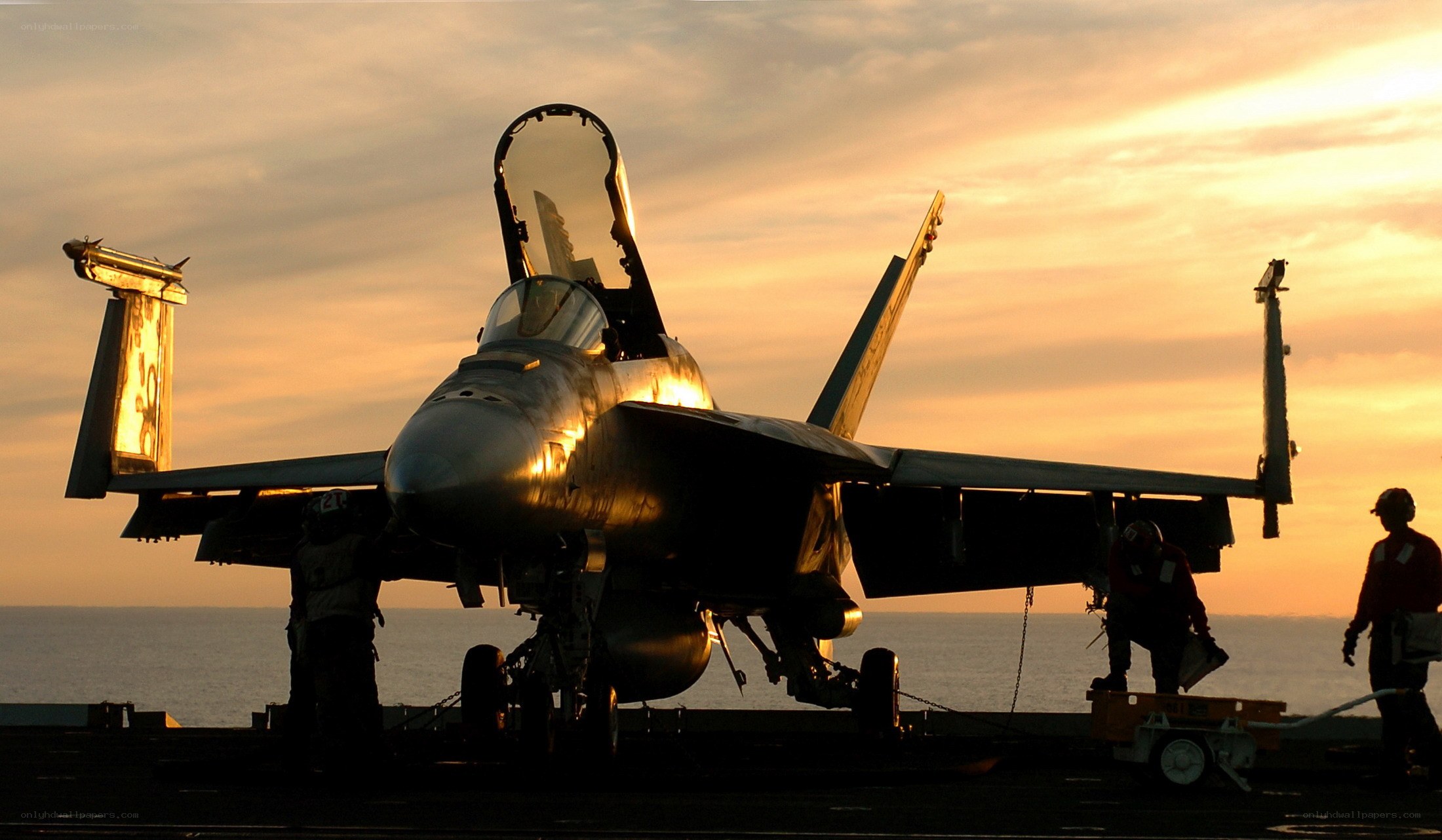 Fighter jet on aircraft carrier deck