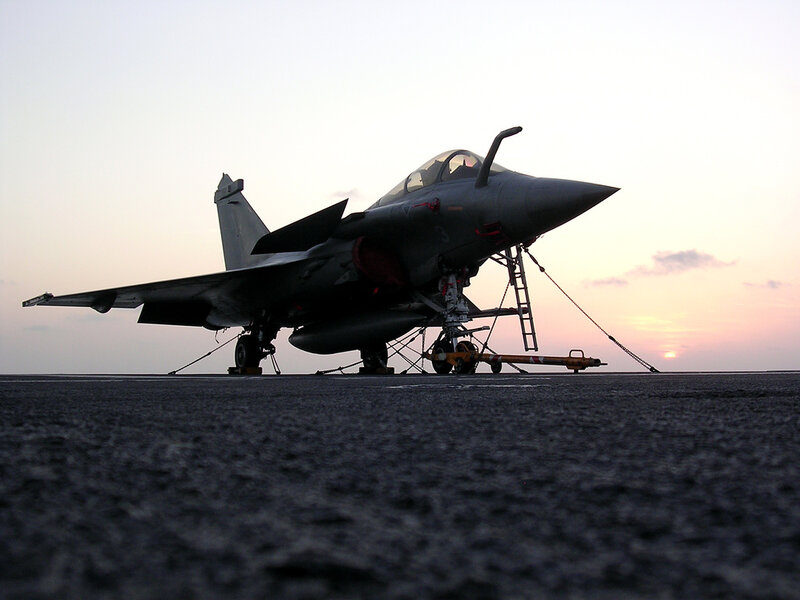 fighter jet on aircraft carrier deck