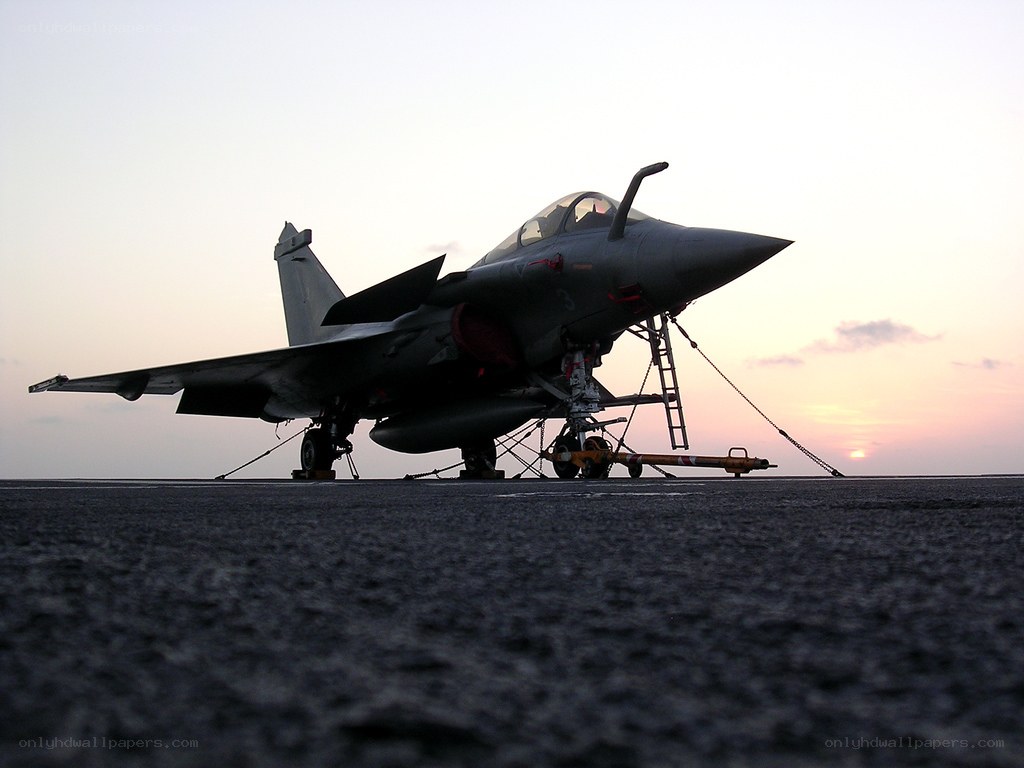 fighter jet on aircraft carrier deck