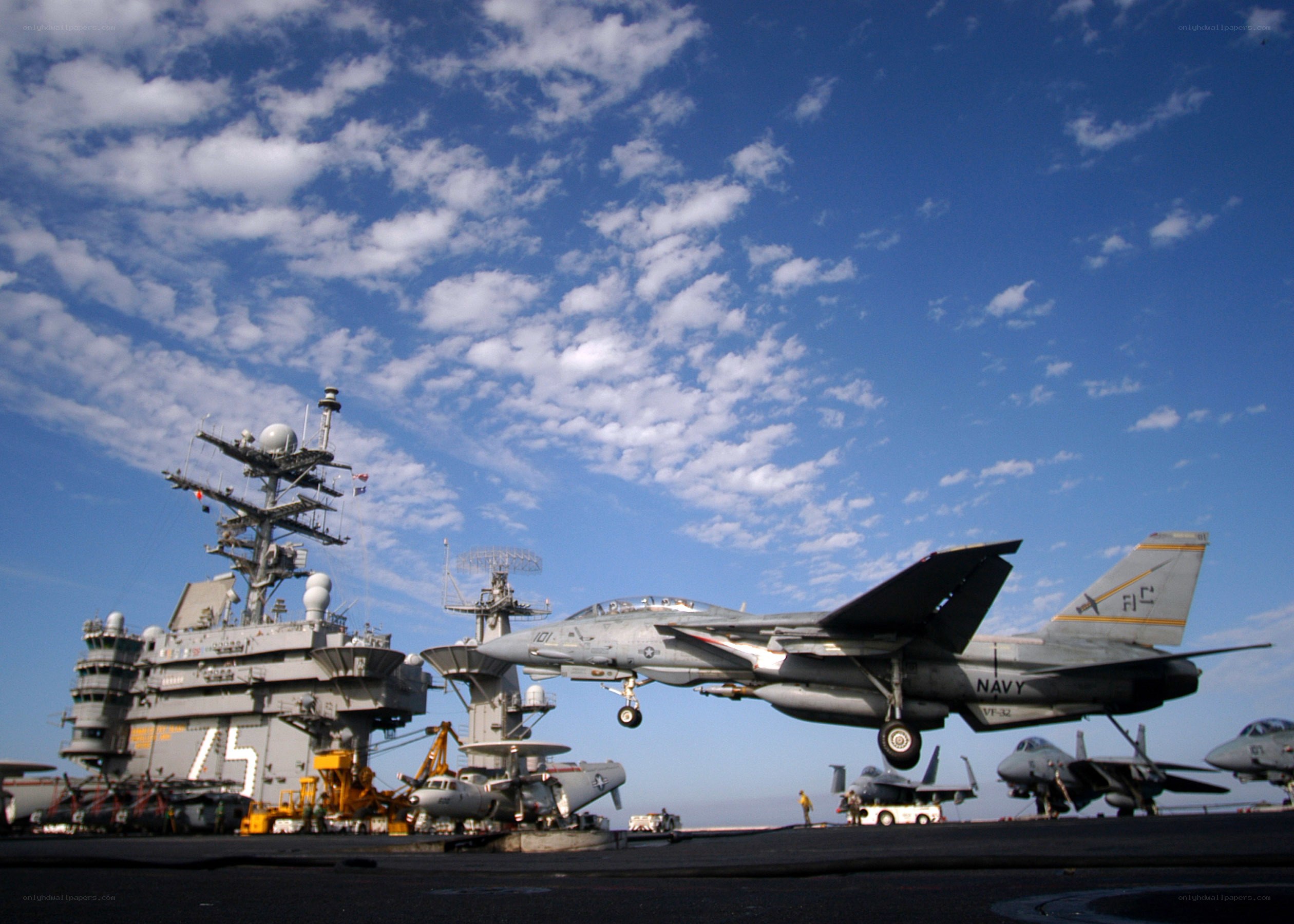 Fighter jet on aircraft carrier deck