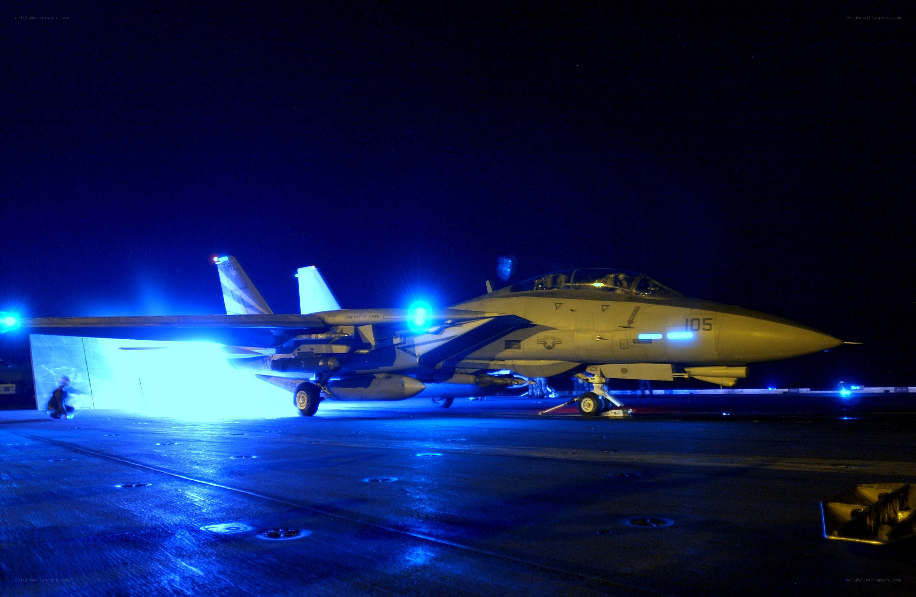 Fighter jet on aircraft carrier deck